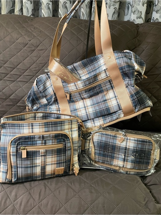 Ihkwip Handbags - 3- piece set by IHKWIP, duffel bag with makeup bag, and crossbody bag